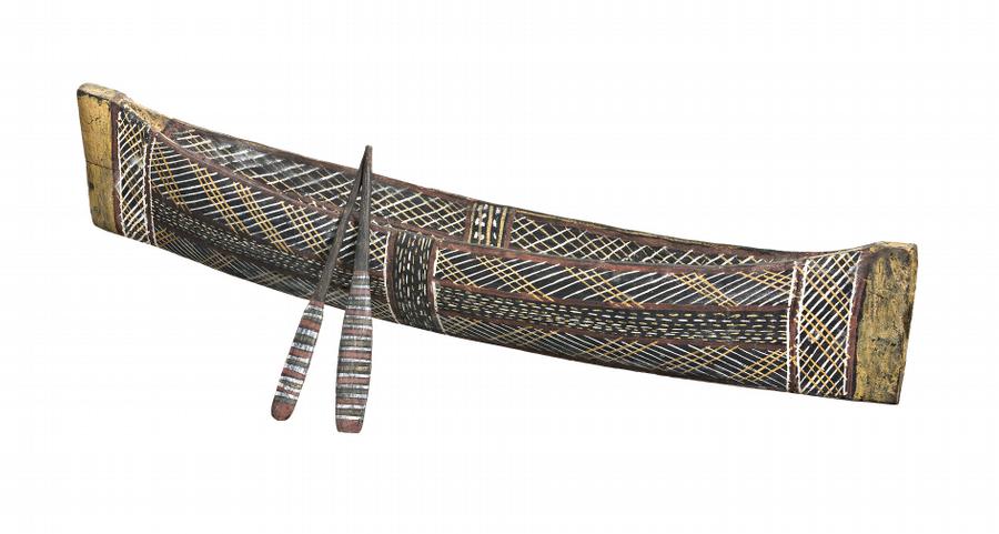 A MINIATURE CANOE AND PADDLES