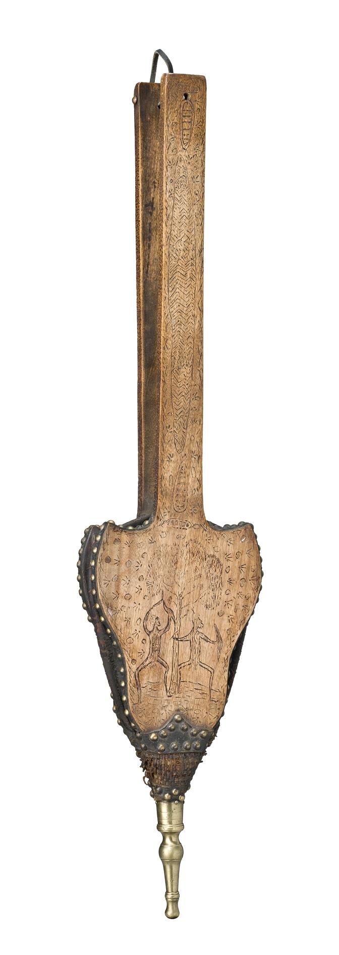 AN ENGRAVED WOODEN BELLOWS