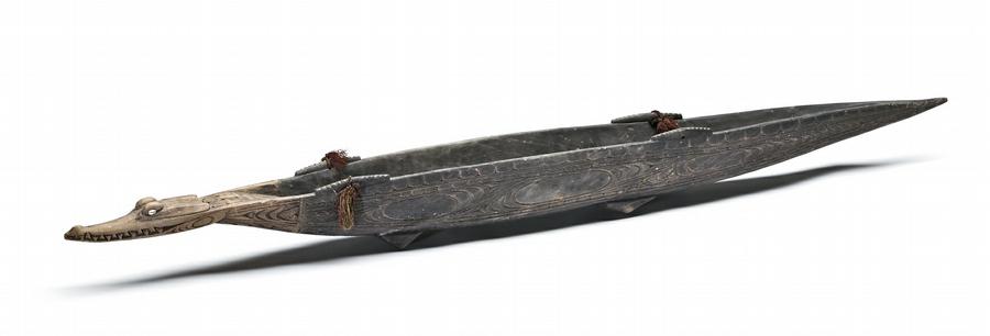 A CARVED FEAST VESSEL IN THE FORM OF A CROCODILE