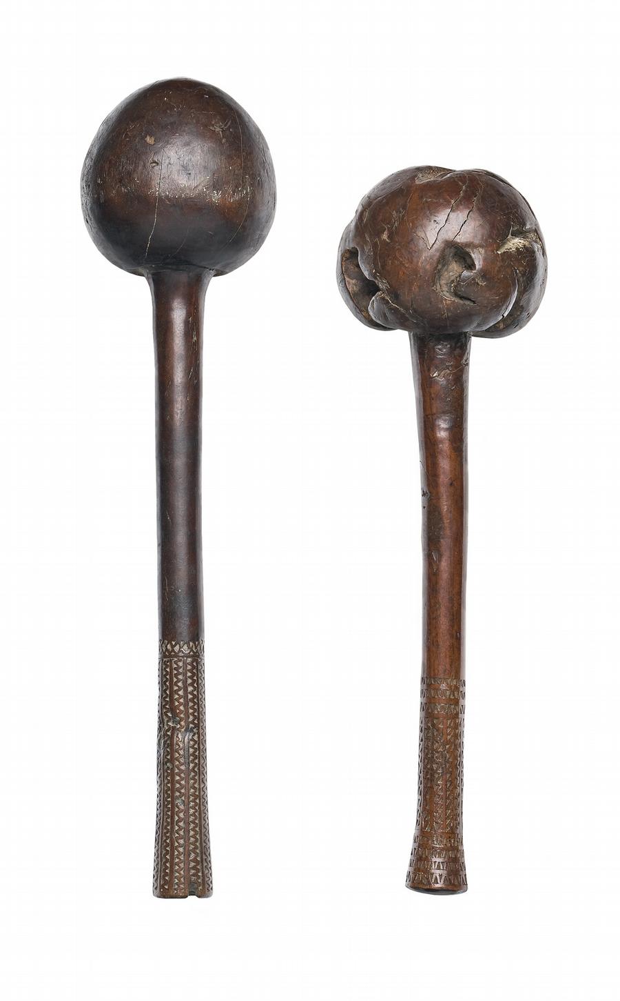 A PAIR OF THROWING CLUBS (ULA)