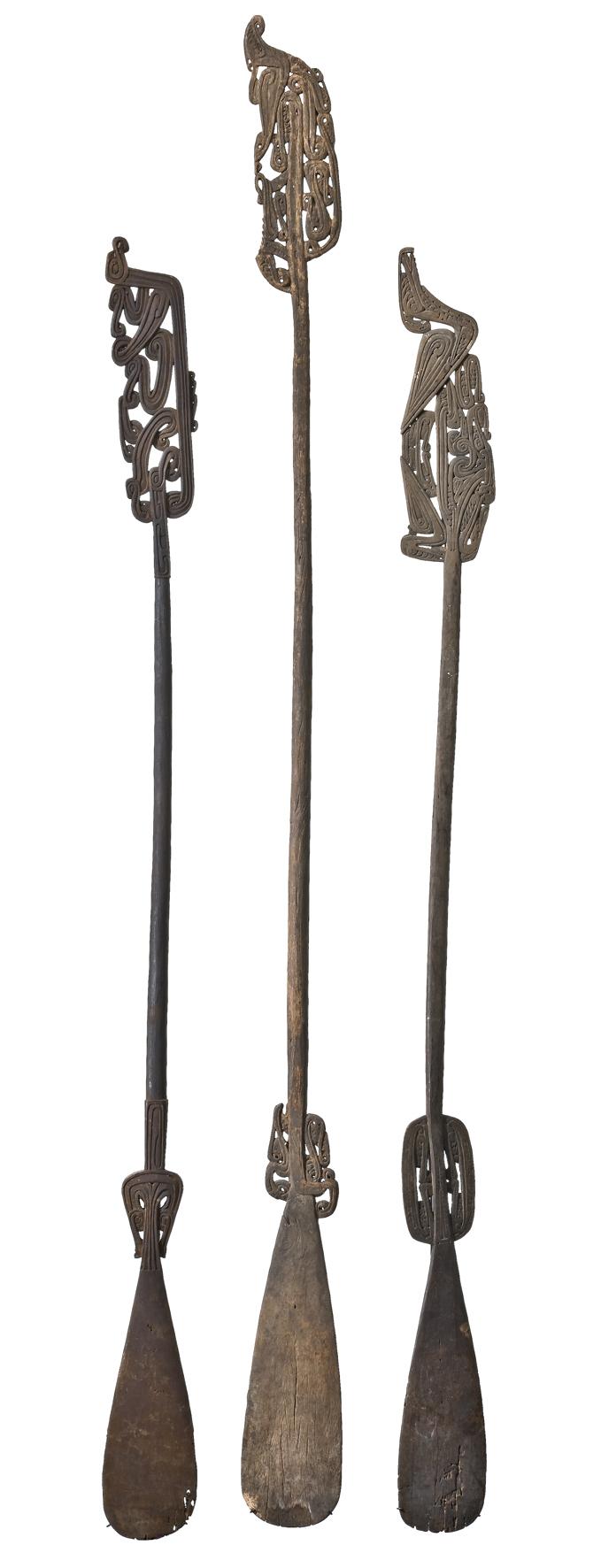 A GROUP OF THREE EARLY MASSIM PADDLES