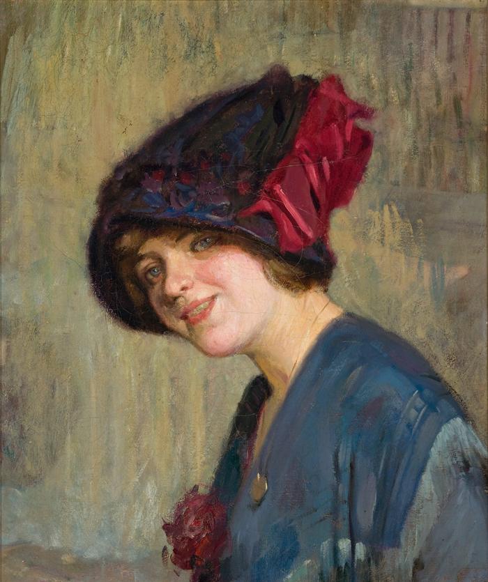 PORTRAIT OF WOMAN WEARING A HAT