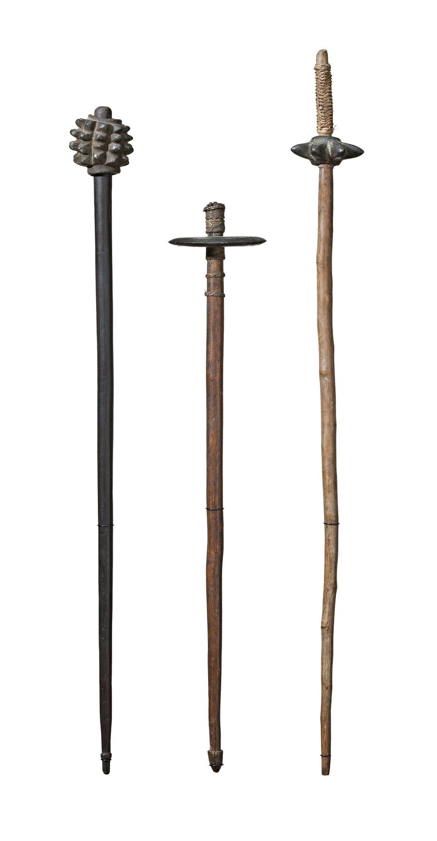 GROUP OF THREE STONE-HEADED CLUBS