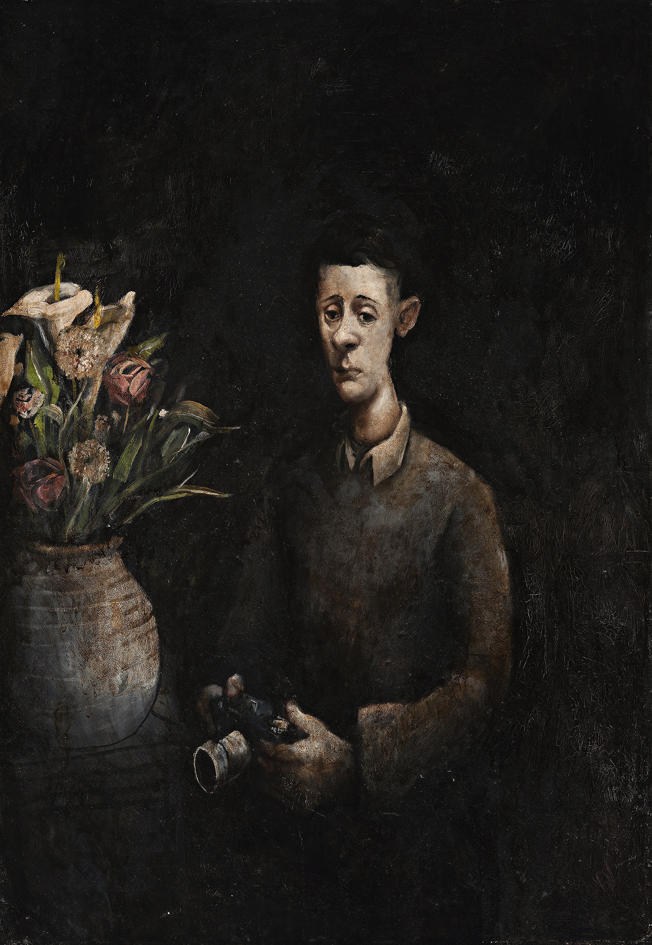 MAN WITH CAMERA AND STILL LIFE