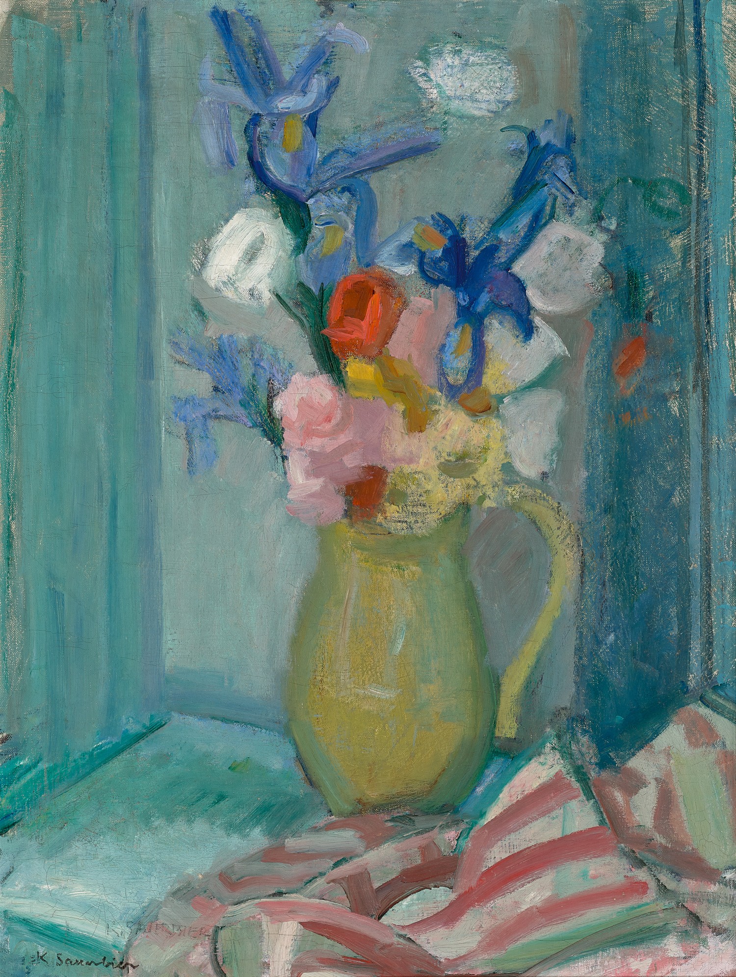 FLOWERS IN GREEN CERAMIC JUG