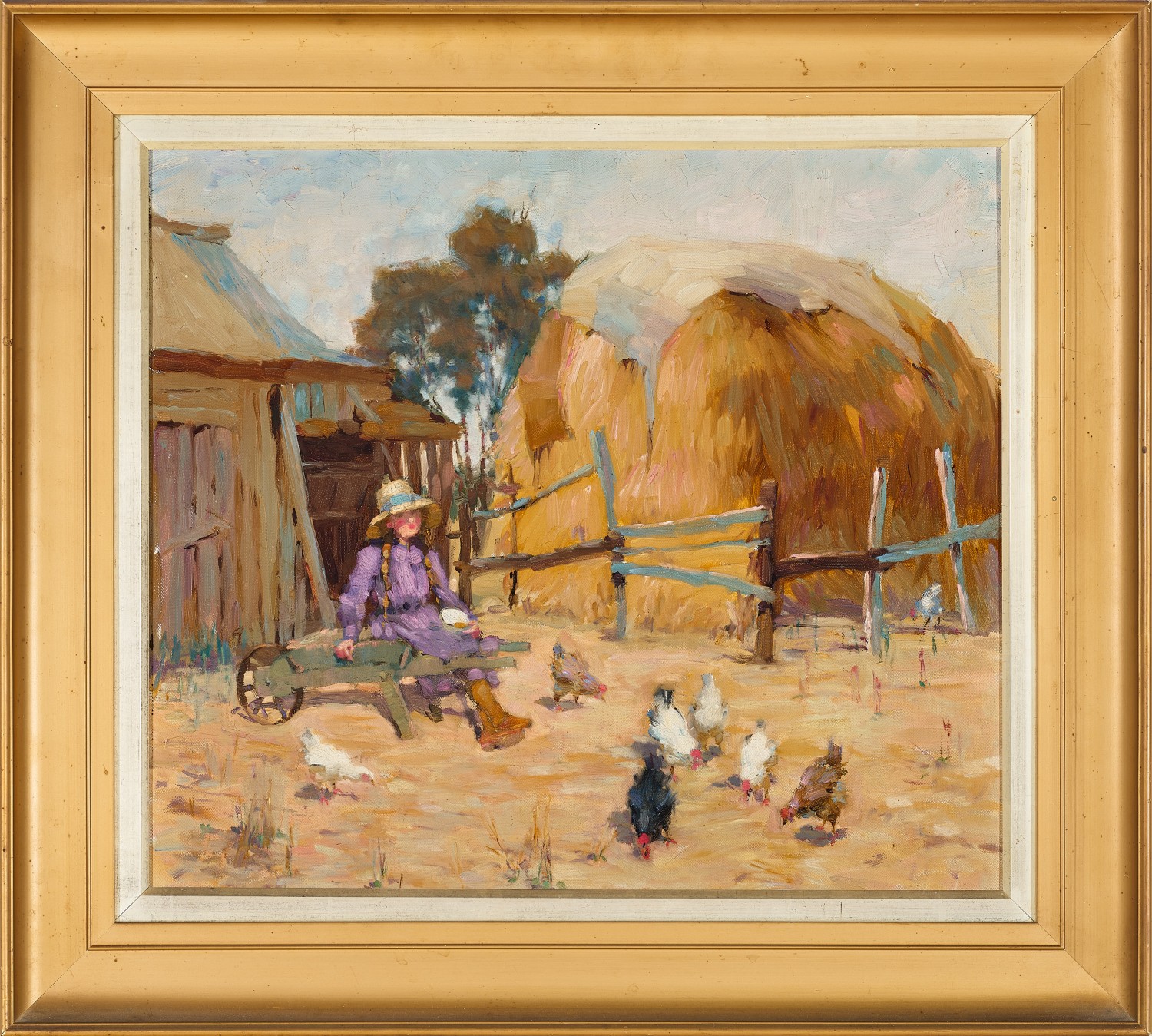 Girl seated on a wheelbarrow in a farmyard