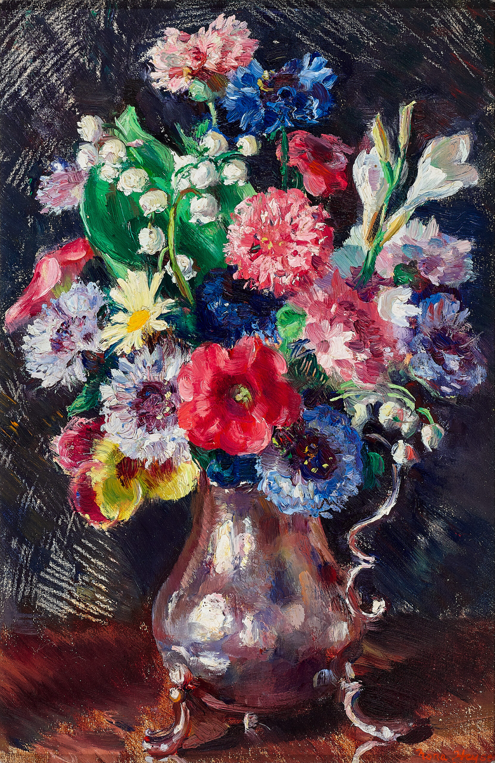 Mixed flowers in a silver jug