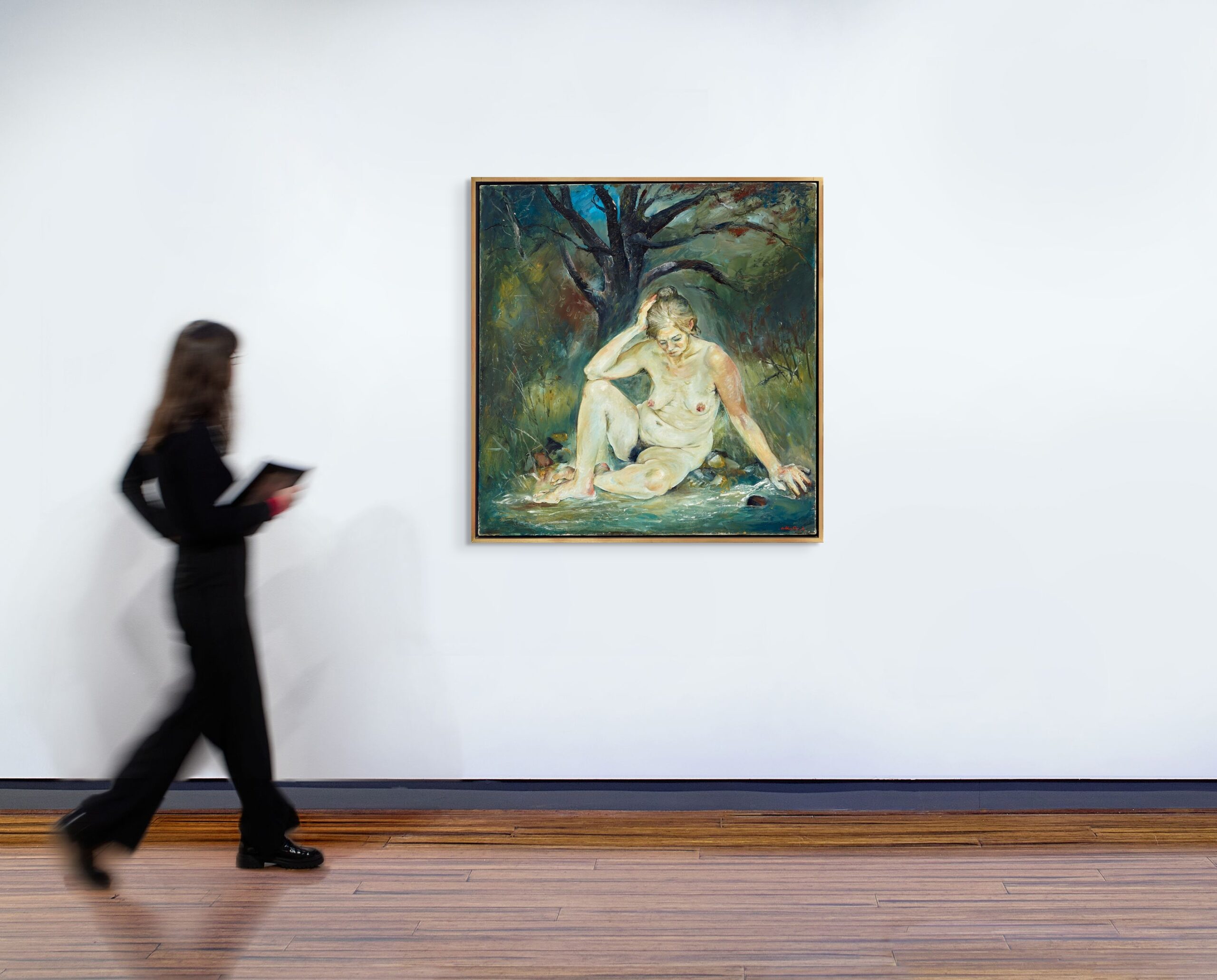 Seated figure by a creek