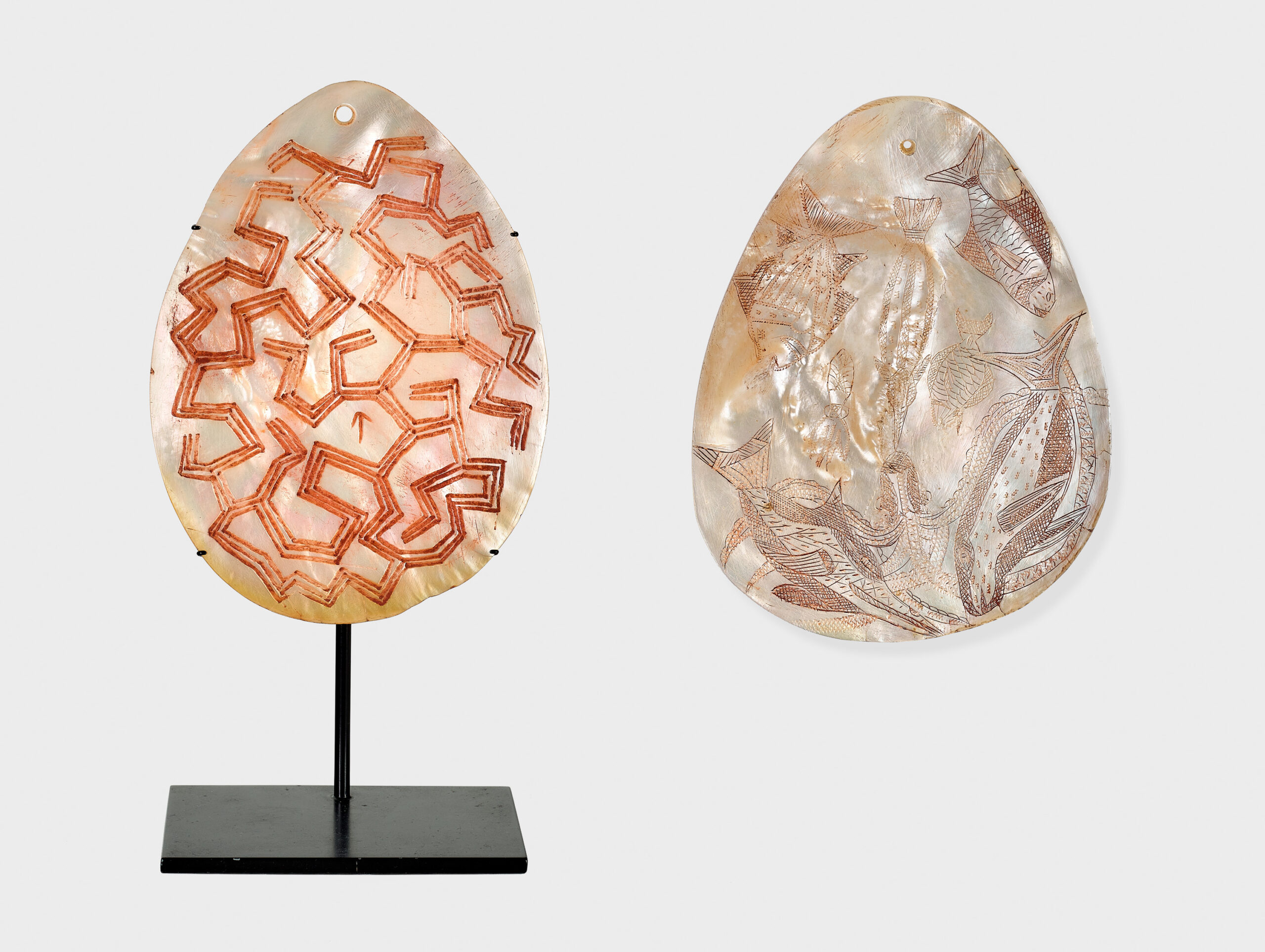 A pair of Western Australian pearl shell pendants (Riji and Jakoli)